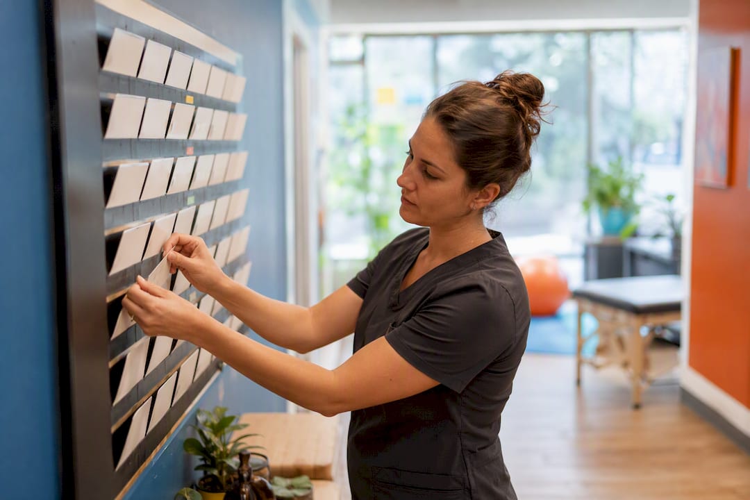 Hands assigning message routing roles on chart