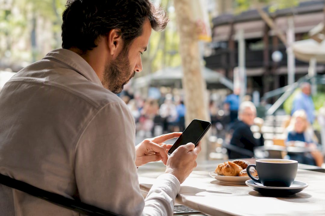Small business owner checking ad frequency